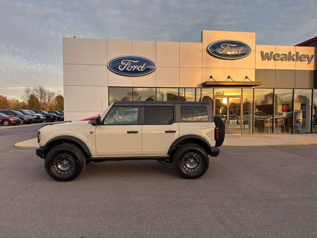 2025 Ford Bronco Badlands in Desert Sand — front three-quarter view