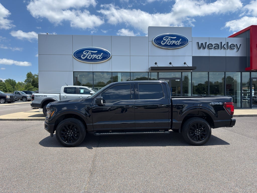 2024 Ford F-150 XLT in Agate Black Metallic — front three-quarter view