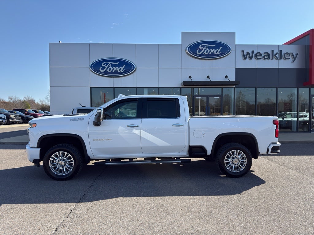 2022 Chevrolet Silverado High Country in Summit White — front three-quarter view
